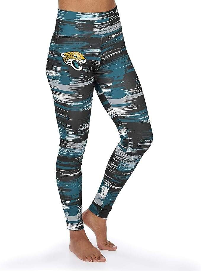 Zubaz NFL WOMEN'S JACKSONVILLE JAGUARS TEAM COLOR BRUSHED PAINT LEGGING