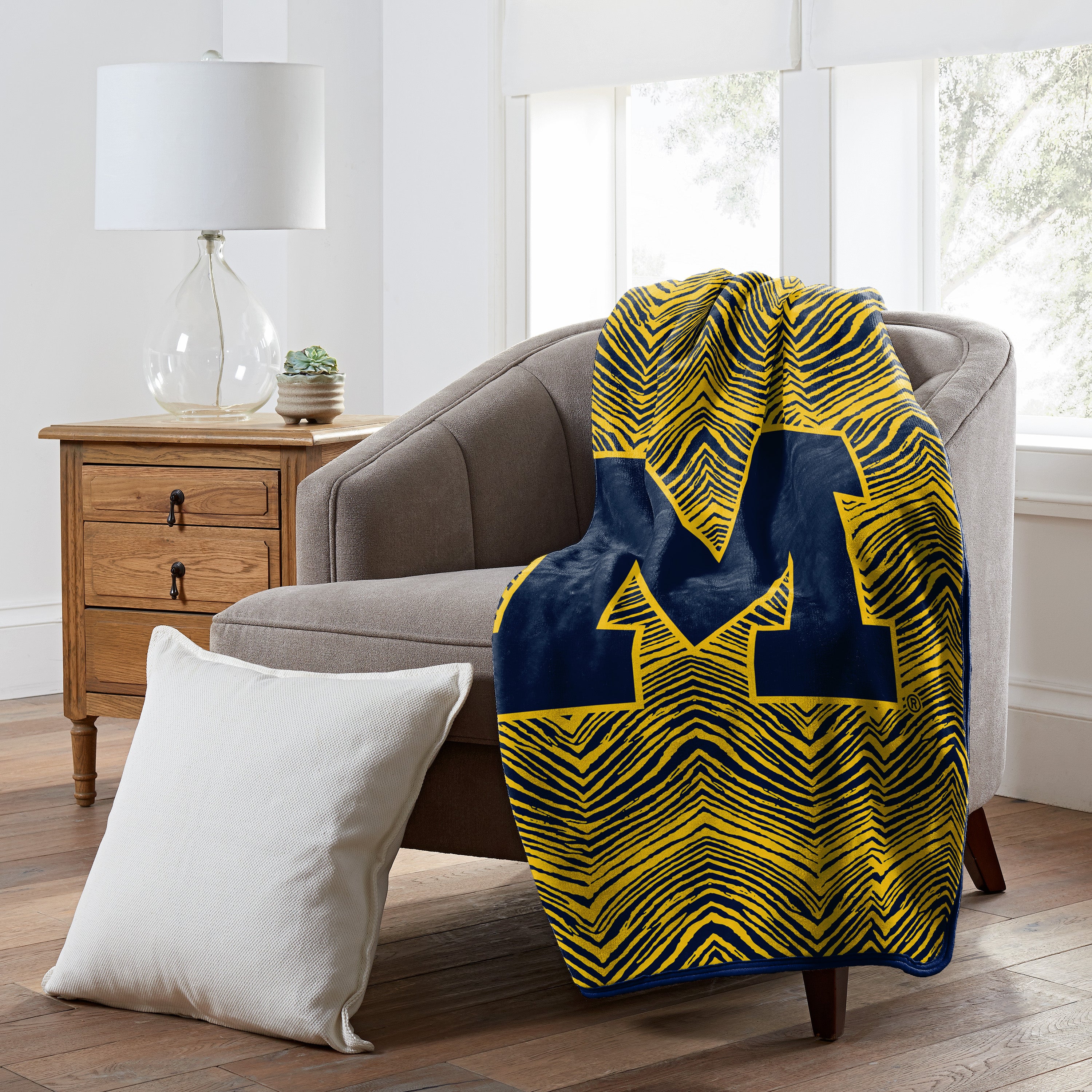 Zubaz by Northwest NCAA Zubified Raschel Throw Blanket, Michigan Wolverines